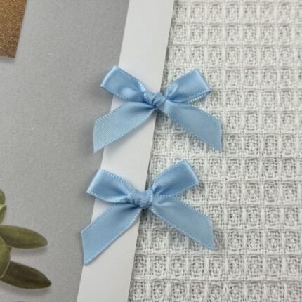 ببيونة ستان لون ازرق سماوي- عرض ١ سم - 50 ببيونة