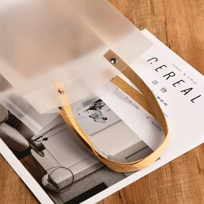 ⁦كيس هدايا شفاف رملي مع يد قش- 5 قطع⁩ - الصورة ⁦4⁩