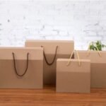 ⁦صندوق هدايا شكل حقيبة- لون بني - 5 قطع⁩ - الصورة ⁦3⁩